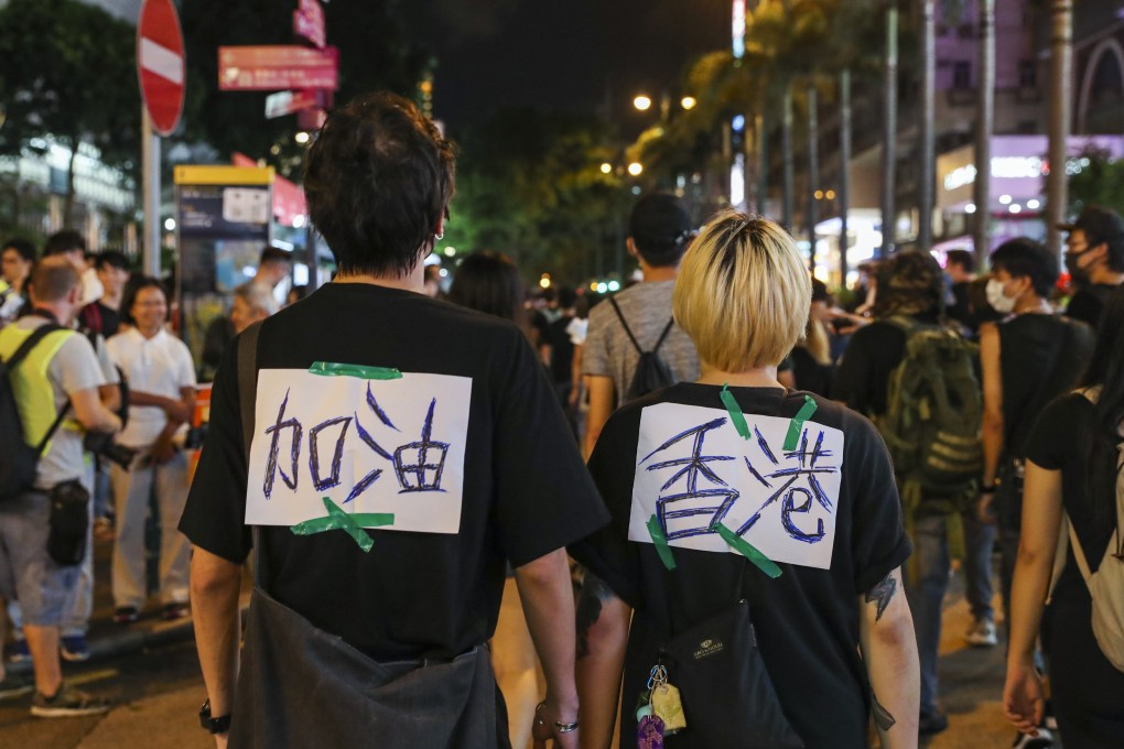 Two protesters at a demonstration against the extradition bill on Sunday. Photo: Sam Tsang