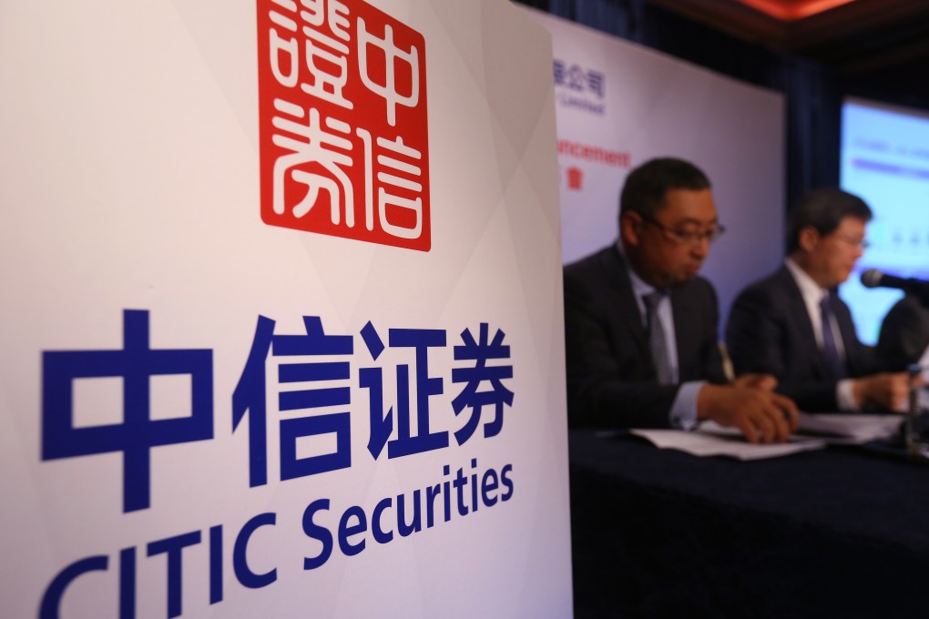 Citic Securities (L to R) Head of Brokerage – International David Shang and Chairman Zhang Youjun during a press conference in Admiralty on 24 March 2016. Photo: SCMP/Edmond So
