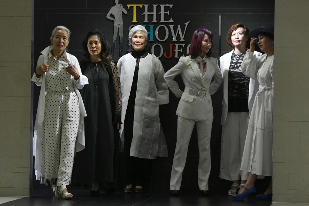 Choi Soon-hwa (third left) and her colleagues during a modelling class. Photo: AFP