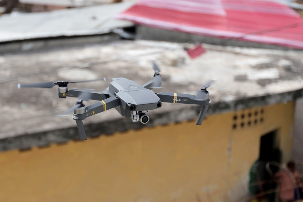 A DJI Technologies drone hovers during a 2017 training session for Somali police in Mogadishu. DJI said on Tuesday it had won clearance from US regulators for new high-security models. Photo: Reuters