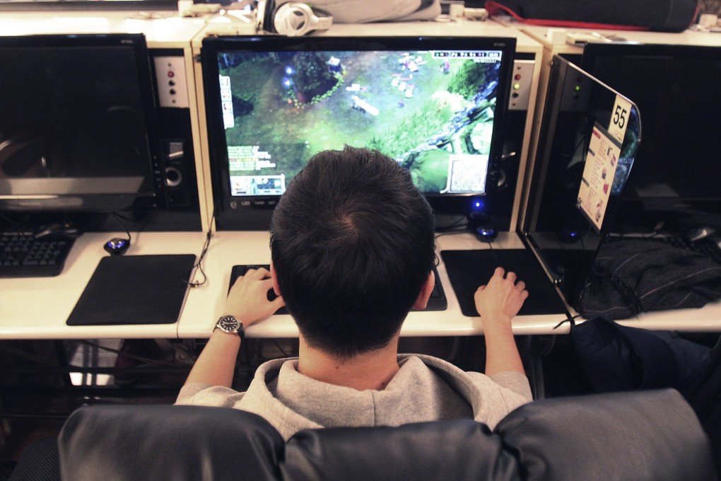A college student plays a computer game at an internet cafe, or ‘PC bang’, in Seoul. Photo: AP