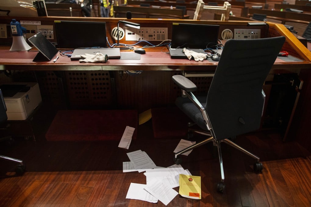 A ripped up copy of the Basic Law lies on the floor after protesters broke into the Legislative Council chambers on July 1. Photo: Bloomberg