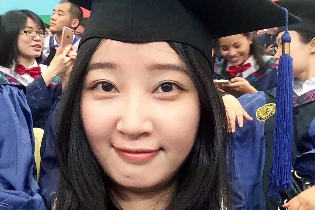 Zhang Yingying in a cap and gown for her graduate degree in environmental engineering from Peking University Shenzhen Graduate School in 2016. Photo: Zhang family via AP