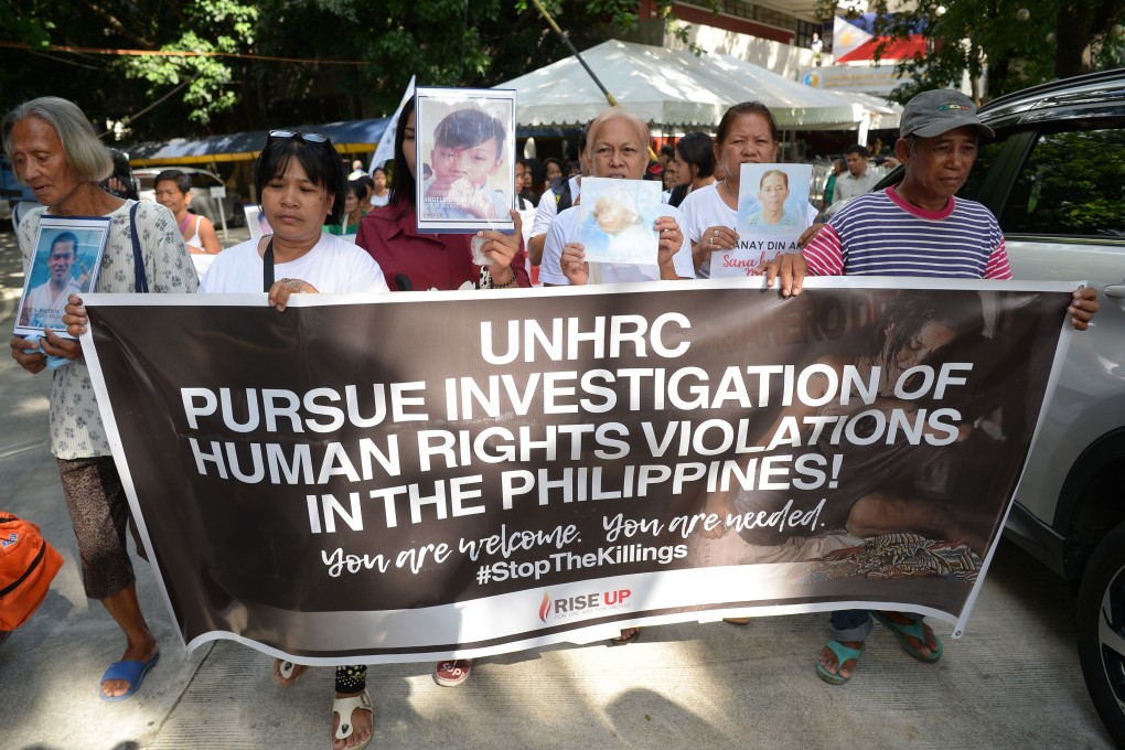 Relatives of drug war victims at a memorial mass in Manila on July 9, 2019. Photo: AFP