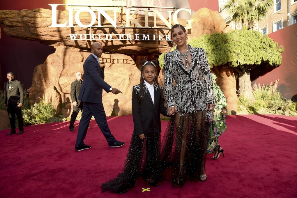 Beyoncé Knowles and her daughter Blue Ivy Carter, both wearing Alexander McQueen, at the world premiere of The Lion King, in Los Angeles, on July 9. Photo: AP