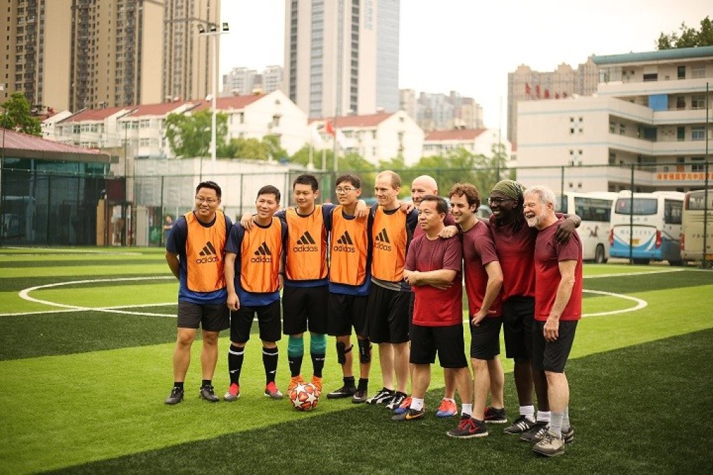 Chinese and American physicists after playing soccer together at a fusion research facility in southeastern China. Photo: Chinese Academy of Sciences