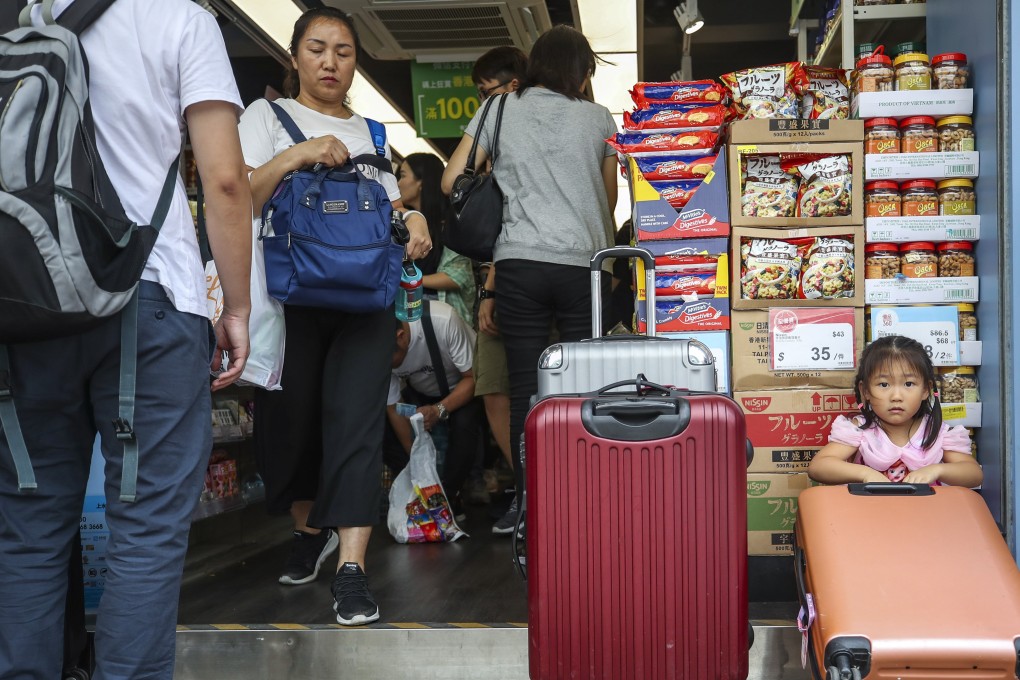 Mainland tourists shopping in Sheung Shui. Photo: Winson Wong