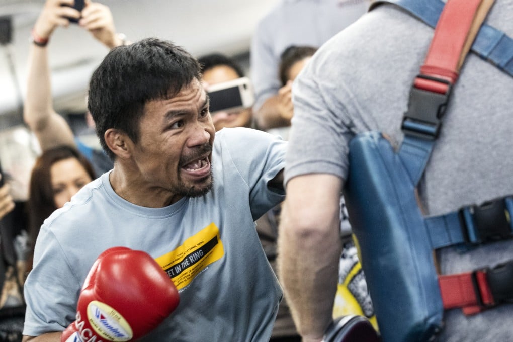 Manny Pacquiao gives it his all as he trains at Wild Card Boxing gym in Los Angeles ahead of his bout against Keith Thurman. Photo: EPA