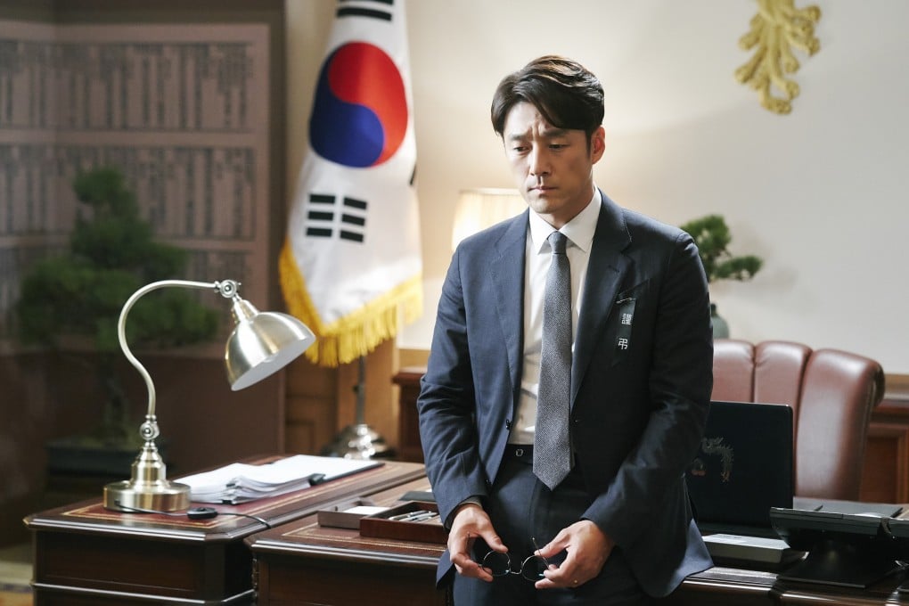 Ji Jin-hee as acting president Park Mu-jin in the Netflix show Designated Survivor: 60 Days. Photo: Netflix