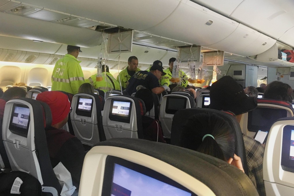 Passengers on the Air Canada flight treated after the plane was hit by severe turbulence and diverted to Hawaii. Photo: AP