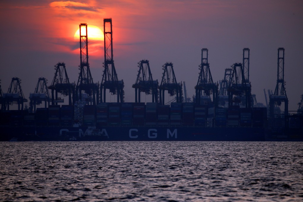 Container cranes are pictured at the port of Singapore, whose economy contracted in the second quarter. Photo: Reuters