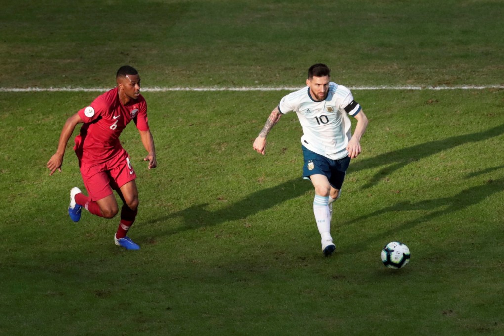 Argentina's Lionel Messi in action with Qatar's Abdelaziz Mohamed at the 2019 Copa America. Photo: Reuters