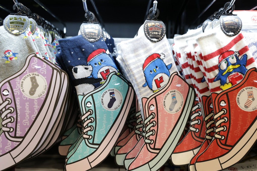 Shoes for sale at Don Don Donki inside the Mira Place mall on Nathan Road, the bargain store featuring a wide range of products from groceries to make-up. Photo: May Tse