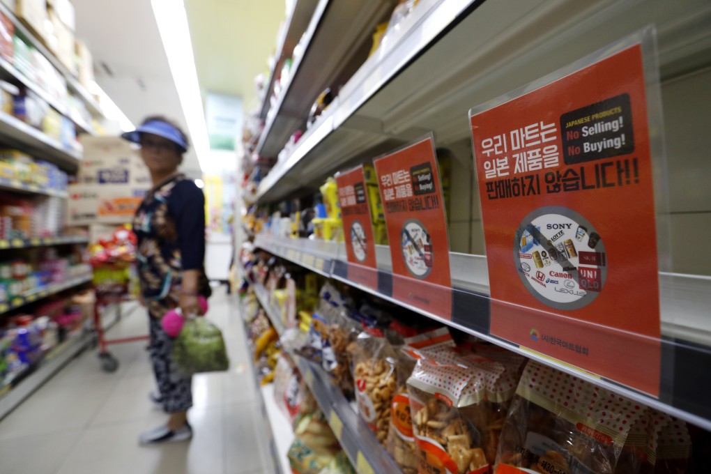 Notices calling for a boycott of Japanese-made products on display at a store in Seoul, South Korea. Photo: AP