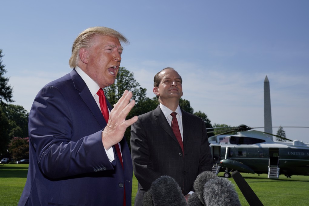 US President Donald Trump announces the resignation of Labour Secretary Alexander Acosta (R) in Washington. Photo: Reuters
