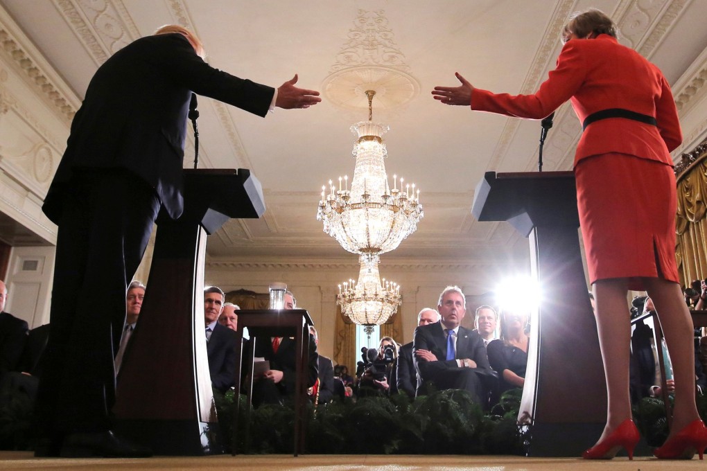 Kim Darroch (centre) listens as US President Donald Trump and British Prime Minister Theresa May hold a joint news conference at the White House in Washington, in 2017. Photo: Reuters