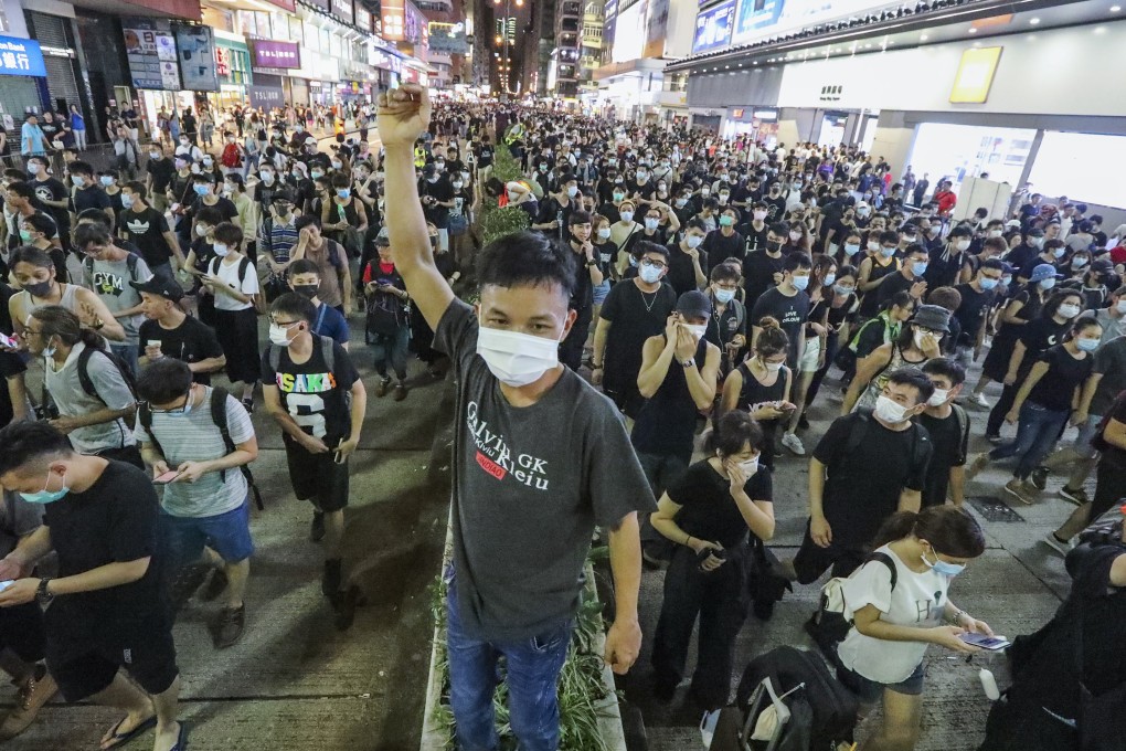 Protesters occupying Nathan Road after a peaceful march on Sunday. Photo: Felix Wong