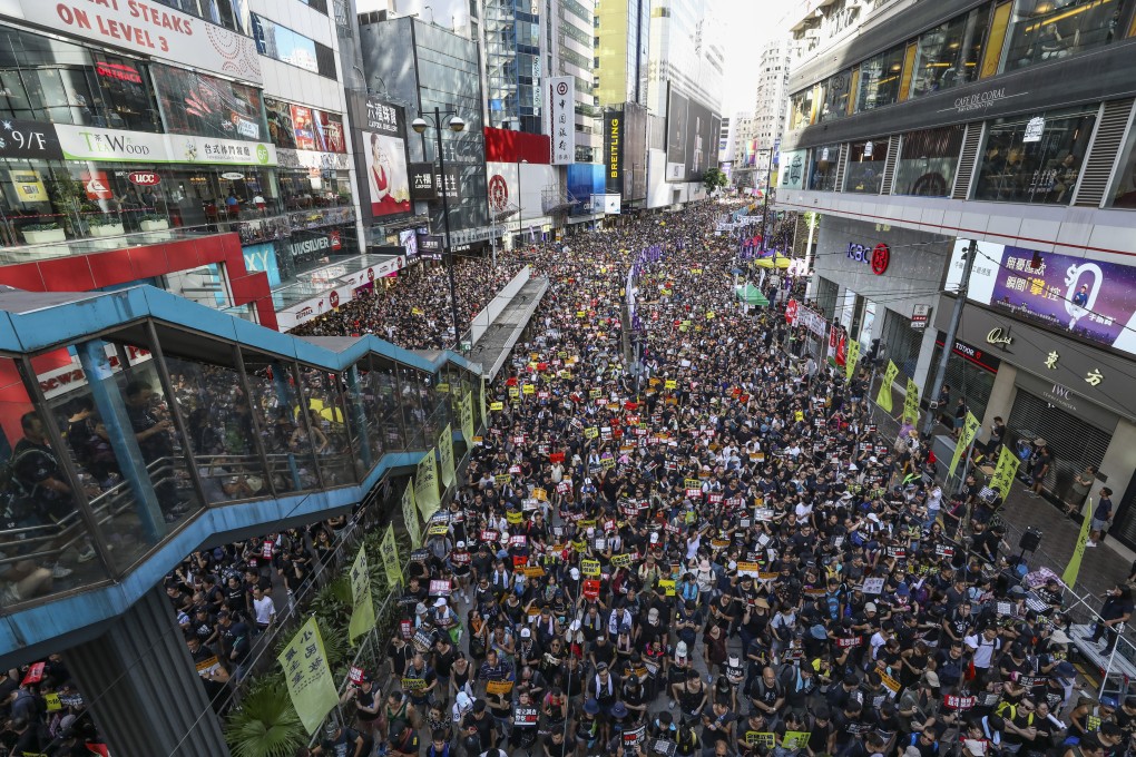 Protesters march against the extradition bill in Hong Kong. Photo: SCMP/Dickson Lee