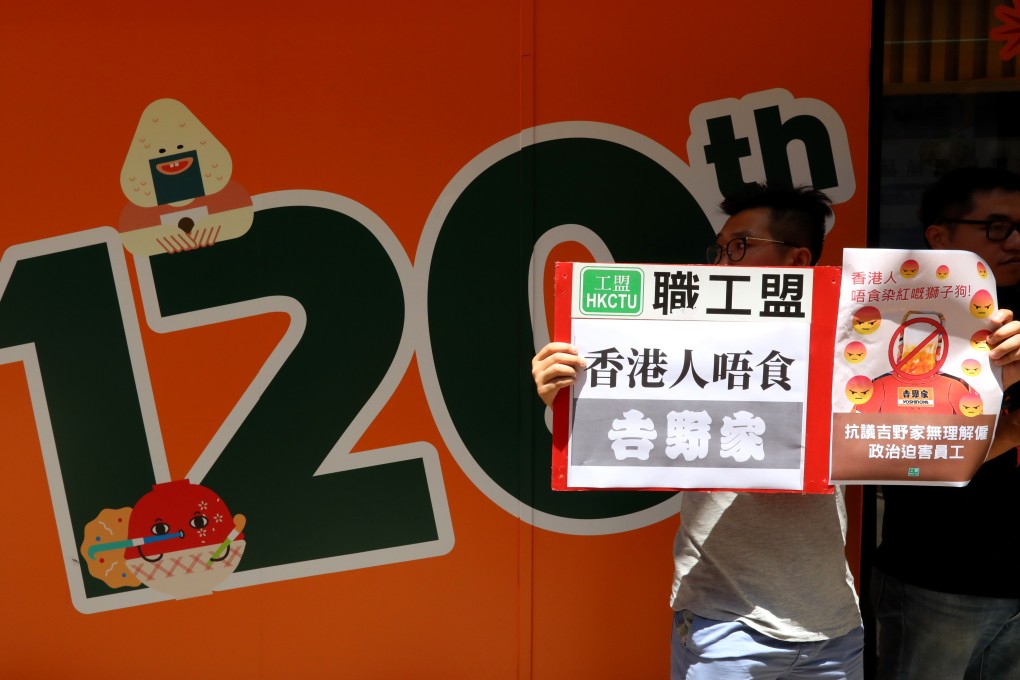 Members of the Hong Kong Confederation of Trade Unions protests outside a Yoshinoya franchise on Friday in Yau Ma Tei. Photo: Felix Wong