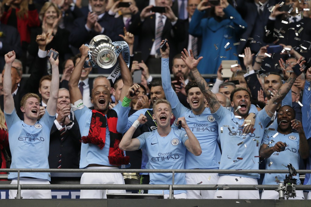 Manchester City celebrate winning the English FA Cup final at Wembley Stadium in May. Photo: AP