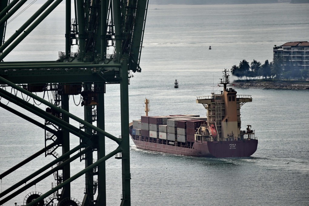 A cargo ship leaves the Tanjong Pagar container port in Singapore. The Lion City’s export-dependent economy has taken a hit from the trade war, with its economy contracting 3.4 per cent in the second quarter of 2019. Photo: AFP