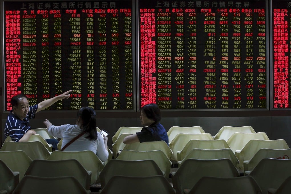 Investors chat as they monitor stock prices at the brokerage house in Beijing on June 6, 2019. Photo: Associated Press