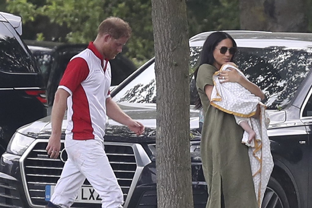Britain's Prince Harry and Meghan, Duchess of Sussex walk with their son Archie at the Royal Charity Polo Day. Archie was wearing dohar from Malabar Baby. Photo: AP