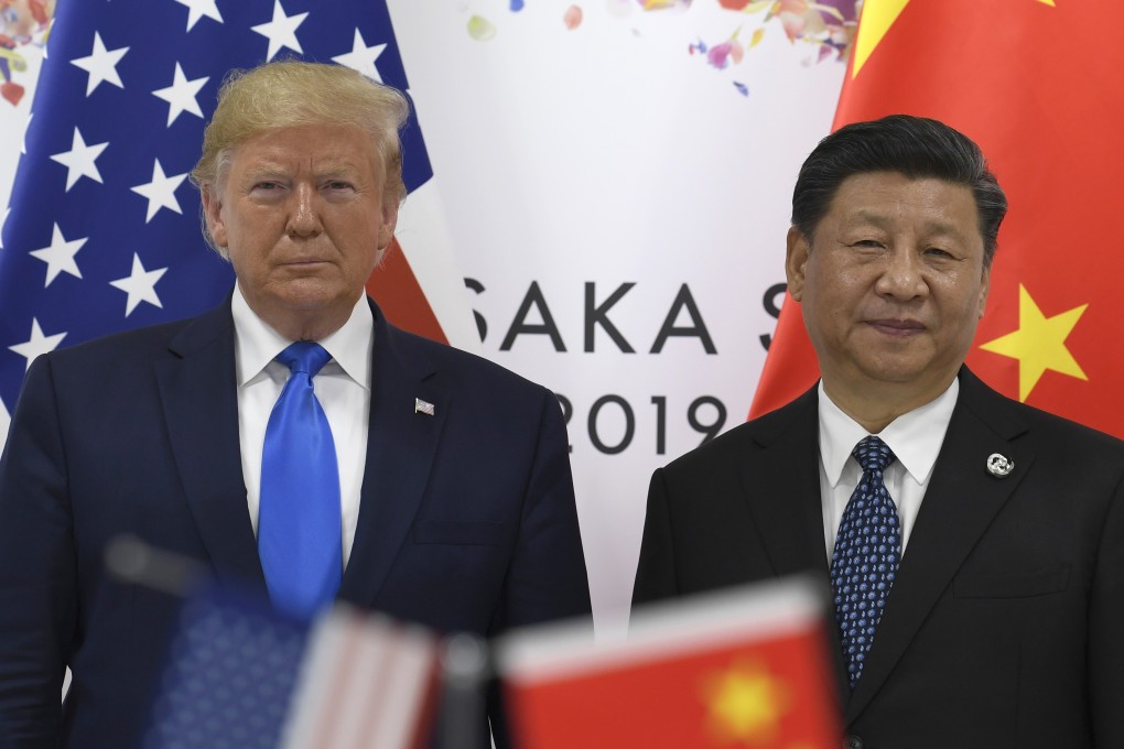 US President Donald Trump and Chinese President Xi Jinping pose for photos during a meeting on the sidelines of the G20 summit in Osaka, Japan, in June. Photo: AP