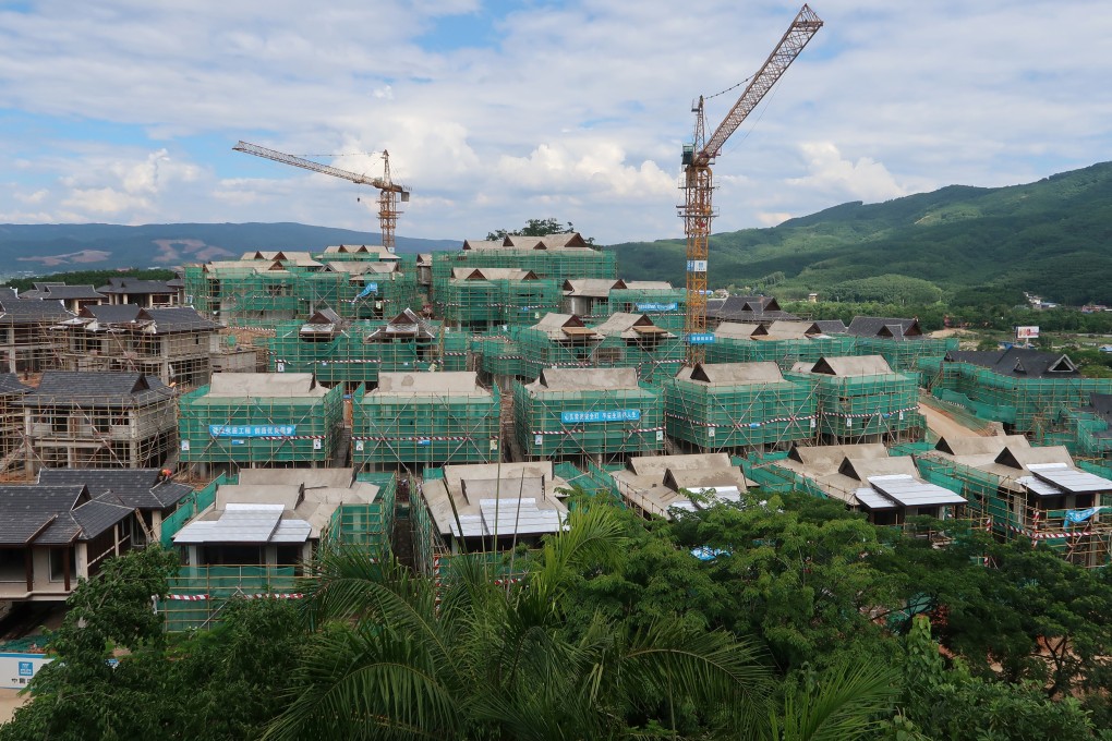 Investment in property development grew by 10.9 per cent in the first half of the year, down from 15.8 per cent in the year to May. Photo: Reuters