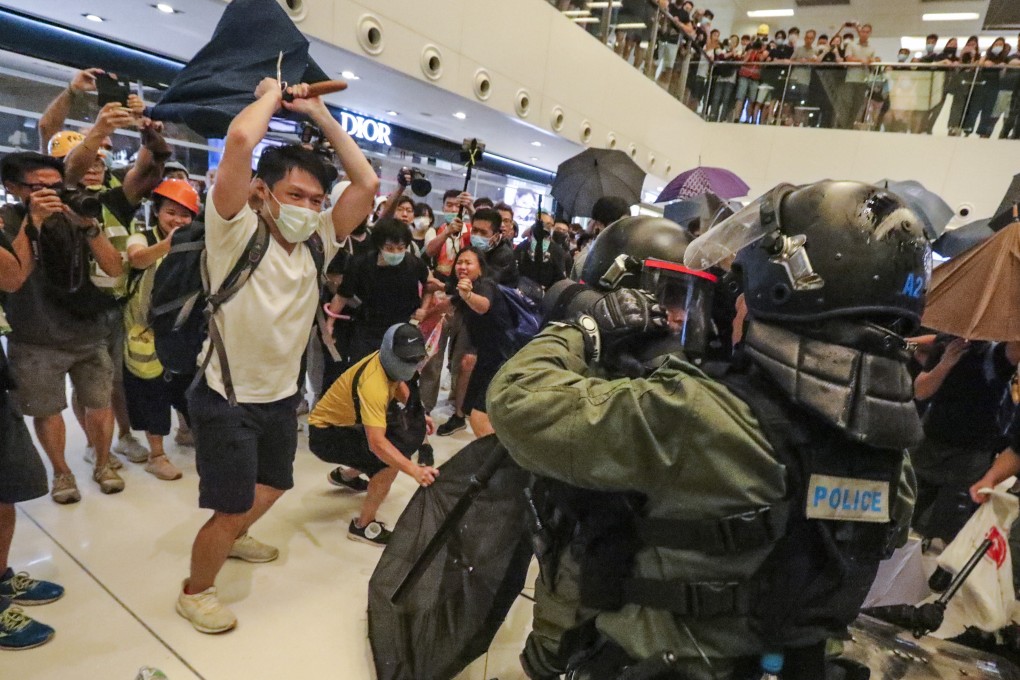 Violent skirmishes break out at New Town Plaza shopping mall after demonstrators march in Sha Tin to demand the withdrawal of the extradition bill. Photo: Felix Wong