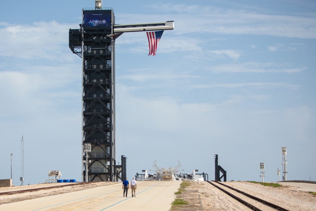 Astronaut Michael Collins (right) walks with Nasa’s Kennedy Space Centre director Robert Cabana at Launch Pad 39A on the 50th anniversary of the launch of the Apollo 11 mission in Cape Canaveral, Florida, on Tuesday. Photto: Nasa via Reuters