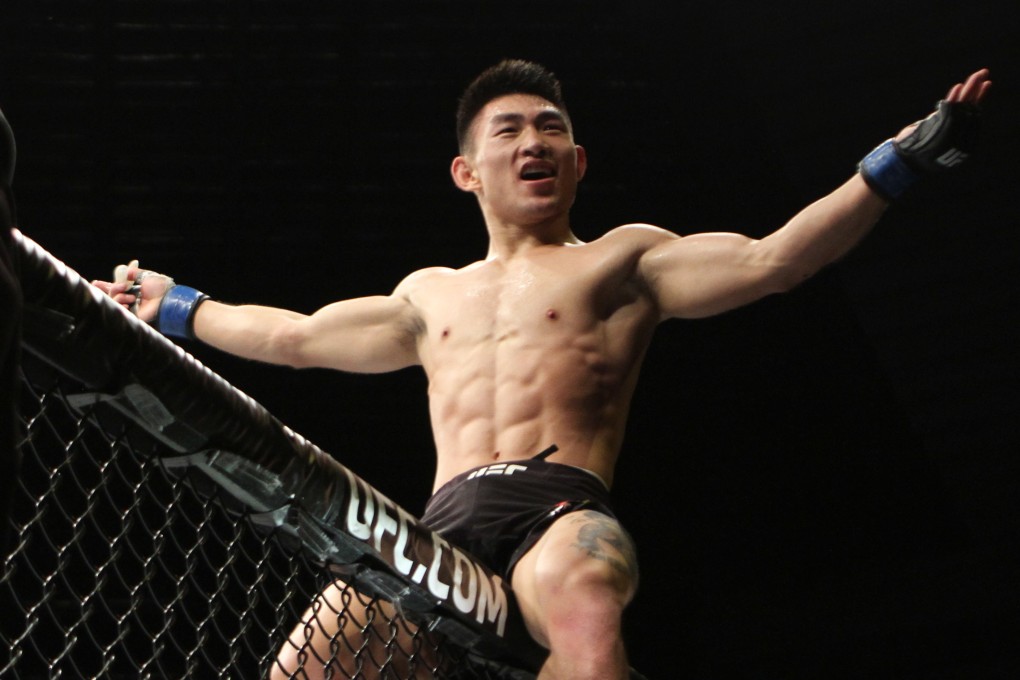 Song Yadong celebrates a win at UFC Singapore. Photo: Lee Li/AsiaMMA