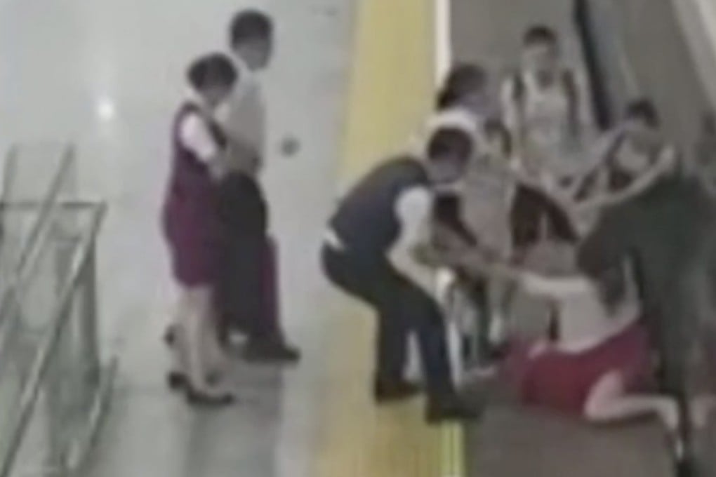 The woman begged railway staff to let her board the train. Photo: Handout