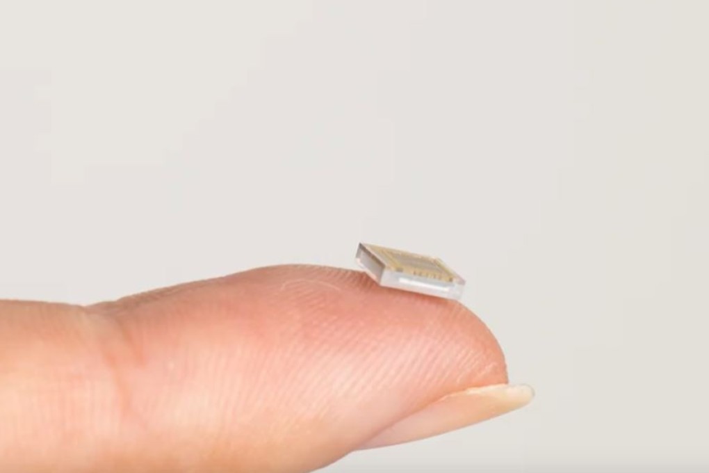 Neuralink unveiled an early version of a tiny sensor that could be implanted in a brain. Photo: Neuralink