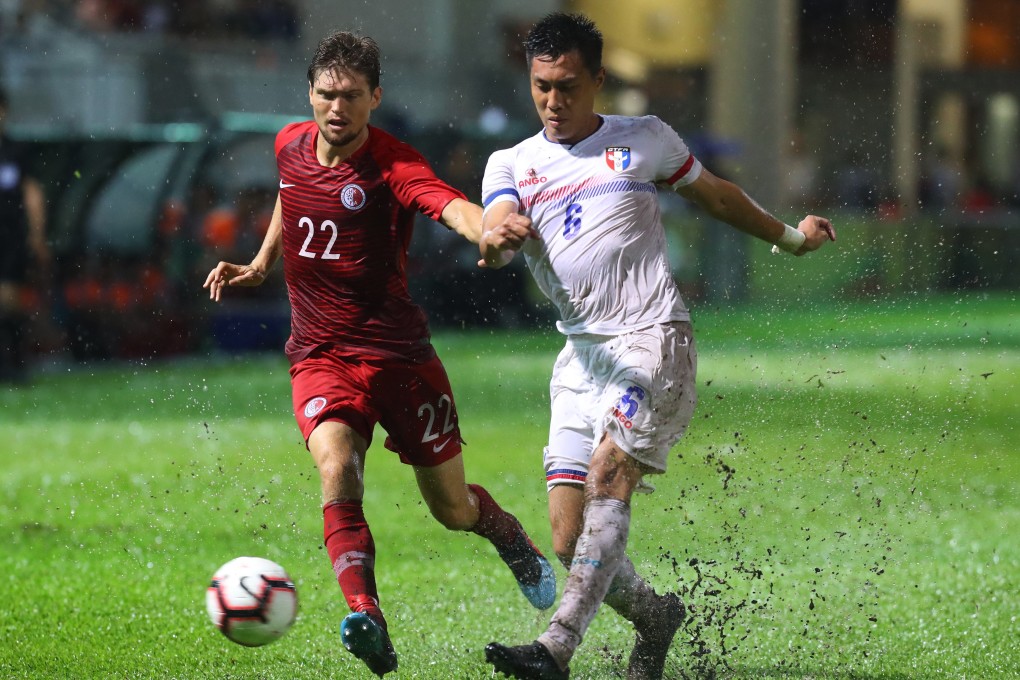 Taiwan’s Chen Wei-chuan (No 6) in action against Hong Kong at Mong Kok Stadium. Photo: Edmond So
