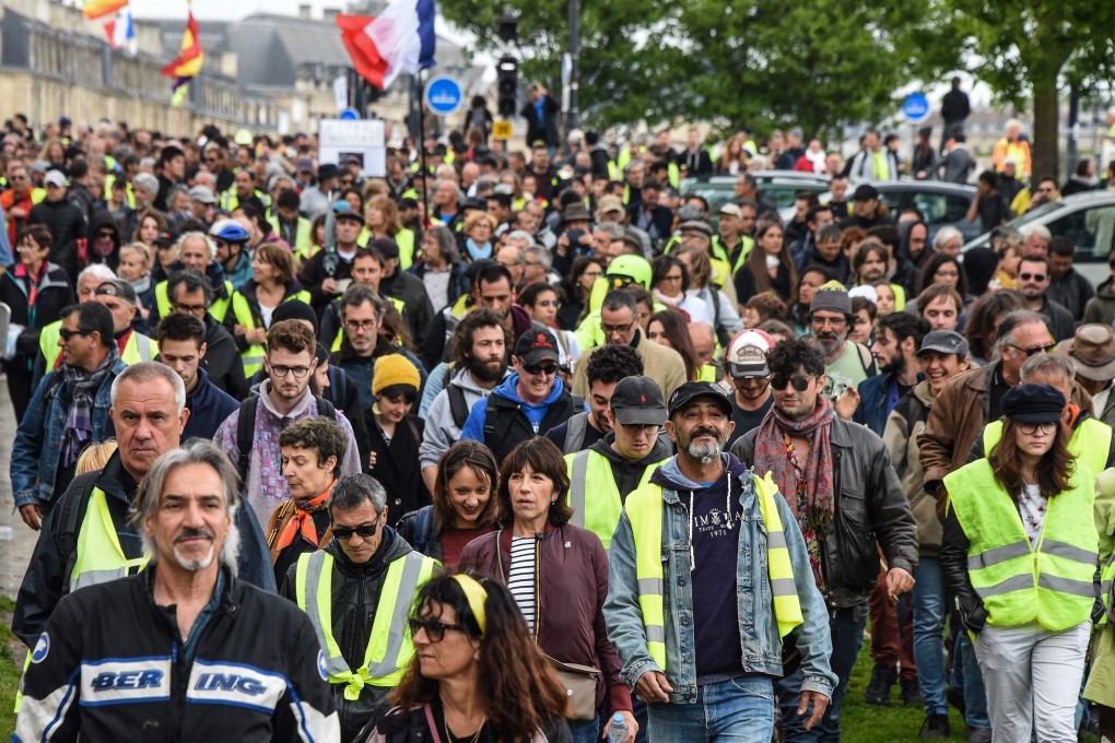 The “yellow vest” or gilets jaunes movement in France started in response to a proposed fuel tax, now suspended, and has widened into a general protest over living costs, government tax reforms and calls for greater social and economic justice. Photo: AFP