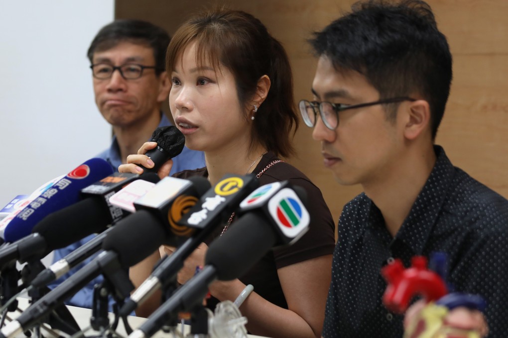 Hui Chi-hoi’s parents (centre and right) at a press conference about the recent heart transplant in Queen Mary Hospital. Photo: Xiaomei Chen