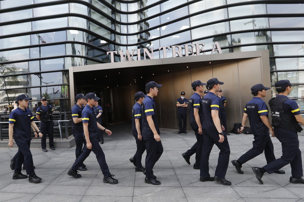 South Korean police officers patrol in front of the building that houses the Japanese embassy. Photo: AP