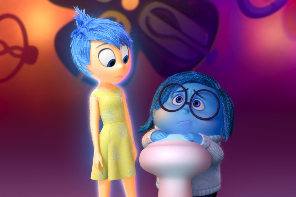 Joy (left, voiced by Amy Poehler) and Sadness (Phyllis Smith) in a still from Inside Out (2015).