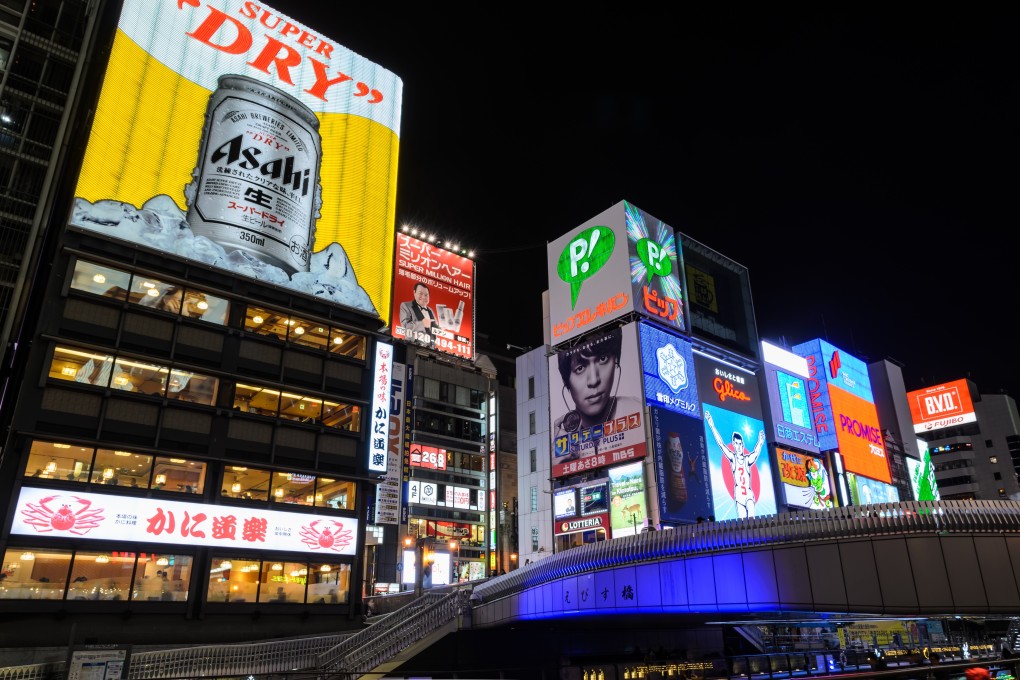 The Aashi Breweries billboard and other illuminated signboards in the Dotonbori area of Osaka, a popular area for night life and entertainment. Photo: Handout