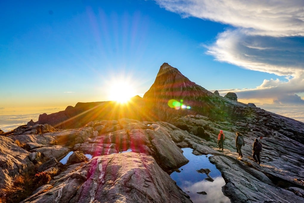 Sunrise above the rocky terrain of Malaysian Borneo’s Mount Kinabalu on the hike down from Low’s Peak. Photo: Nam Cheah