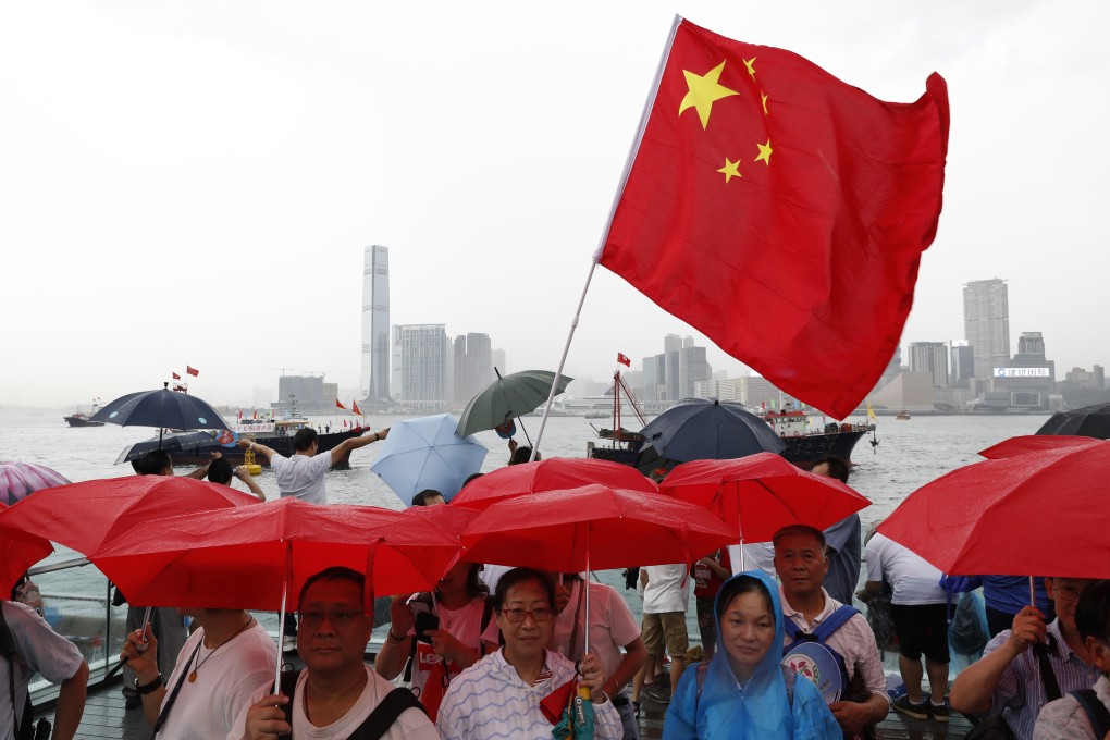 A pro-Beijing, pro-police rally in Hong Kong on Saturday drew 316,000 people according to organisers. Photo: AP
