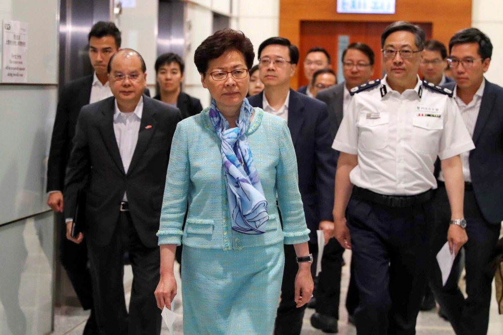 Chief Executive Carrie Lam Cheng Yuet-ngor heads to a press briefing at 4am on June 2 at the police headquarters in Wan Chai, after extradition bill protesters occupied the Legislative Council complex. Following behind are (from left) Chief Secretary Matthew Cheung Kin-chung, Secretary for Security John Lee Ka-chiu and Police Commissioner Stephen Lo Wai-chung. Photo: Edmond So