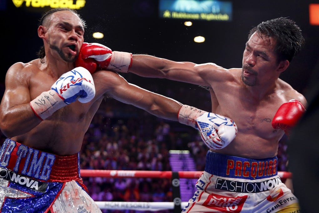 Manny Pacquiao lands a punch on Keith Thurman during his points victory over the defending welterweight champion. Photo: AP