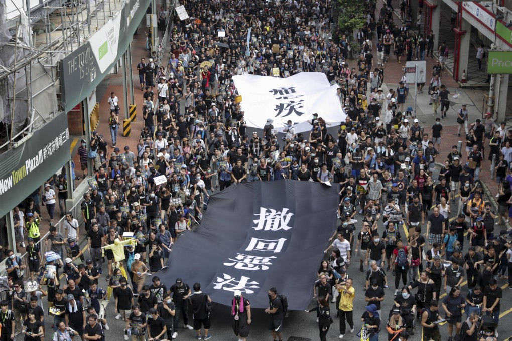 Protesters march in one of many shows of public discontent with the government’s now-suspended extradition bill. Photo: Edmond So