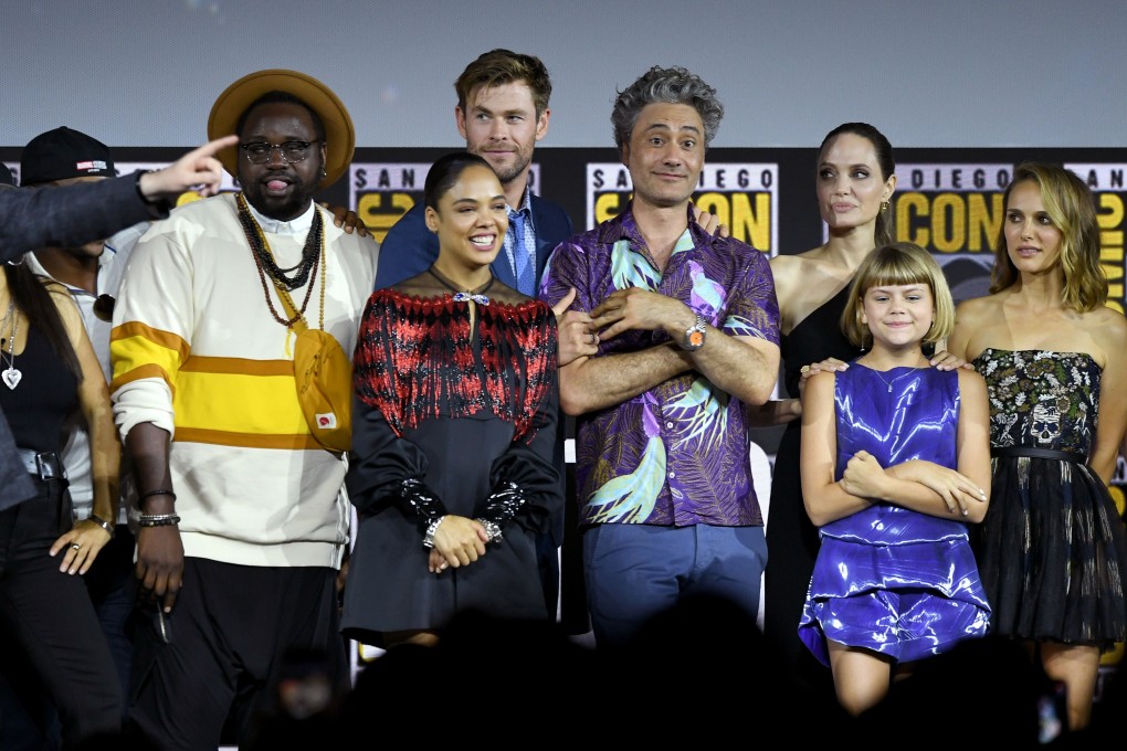 From left: Brian Tyree Henry, Tessa Thompson, Chris Hemsworth, Taika Waititi, Angelina Jolie, Lia McHugh and Natalie Portman at the Marvel Studios Panel at 2019 Comic-Con International. Photo: Kevin Winter/Getty Images/AFP