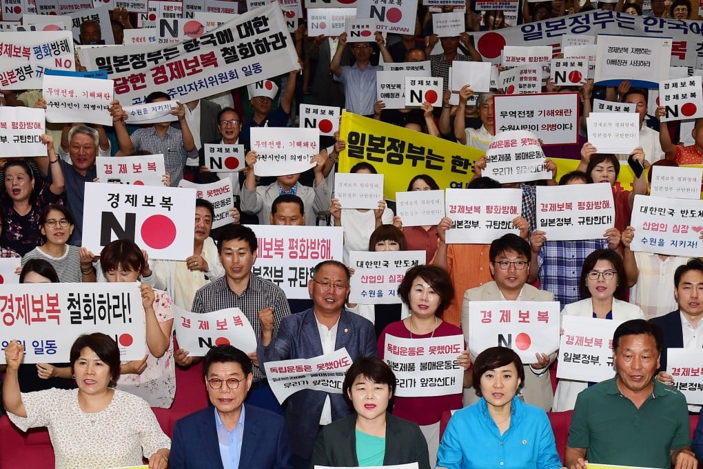 South Koreans rally in Suwon, south of Seoul, demanding Japan abandon its export restrictions. Photo: EPA