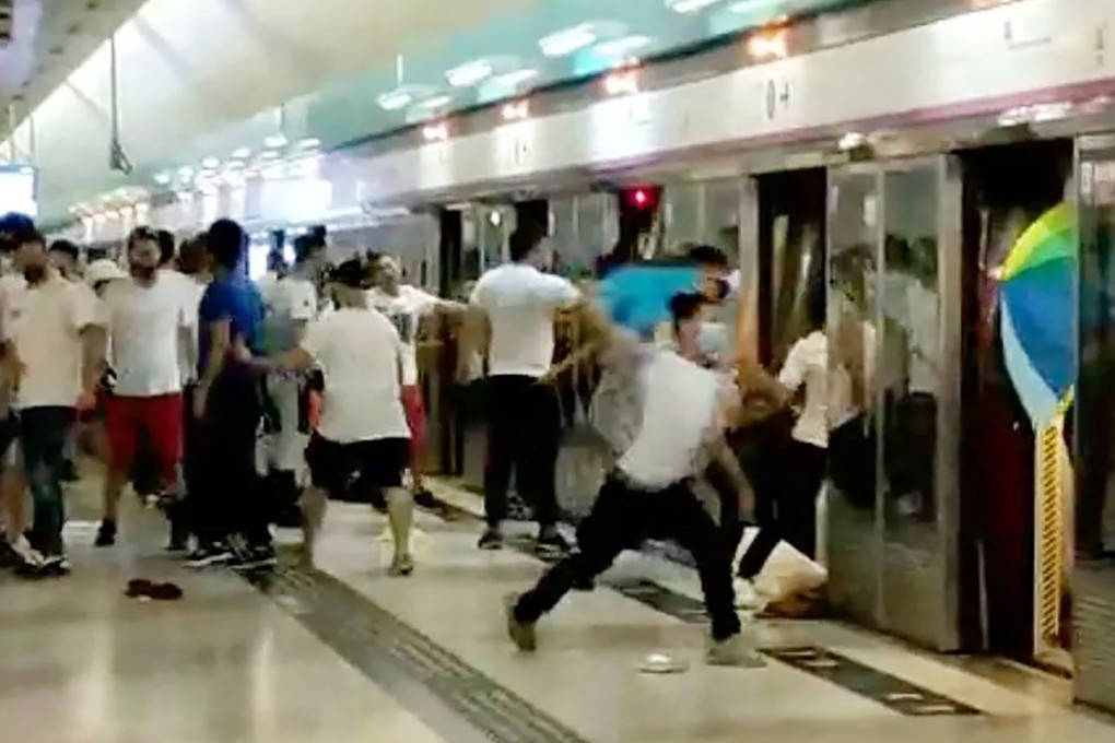 A screen grab from a video showing a group of people in white assaulting passengers at the Yuen Long MTR station. Photo: Handout