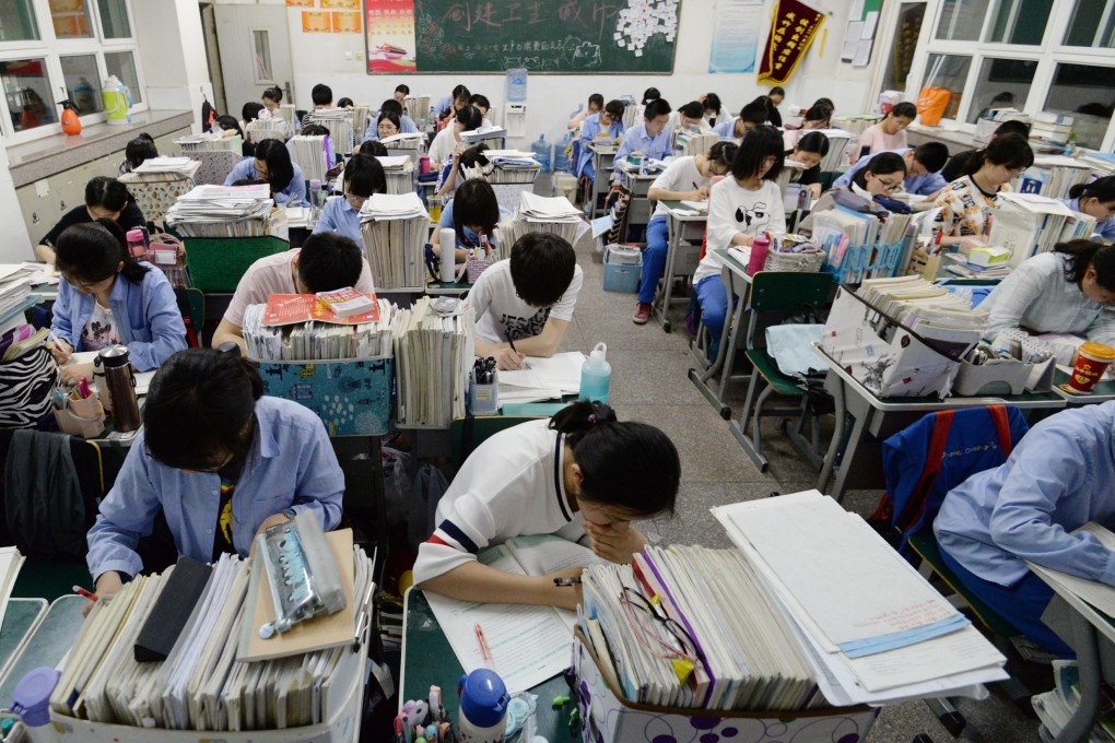 Chinese students are under huge pressure to do well in the annual college entrance exam. Photo: EPA-EFE