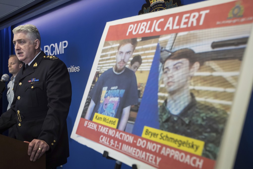 Security camera images recorded in Saskatchewan of Kam McLeod and Bryer Schmegelsky are displayed as RCMP Assistant Commissioner Kevin Hackett speaks during a news conference in Surrey, British Columbia, on Tuesday. Photo: Canadian Press via AP
